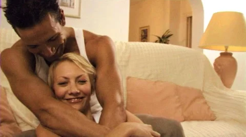 Young couple in bed Stock Footage 43699525