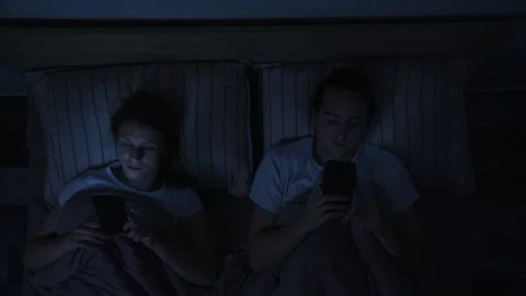 Young couple in bed. Stock Footage 147104383