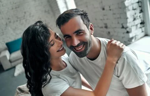 Young couple in bed Stock Photos