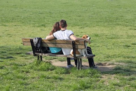 Young couple on bench Stock Photos