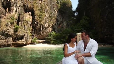 Young couple on a boat Stock Footage 38298969