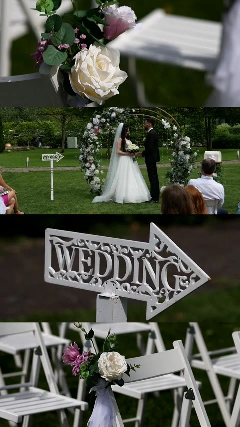 Young couple bride and groom standing near luxurious arch of fresh flowers at Stock Footage 307148341