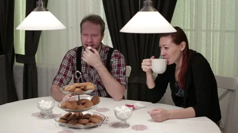 Young couple in a cafe drinking coffee Video stock 62890634