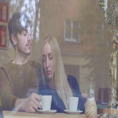 Young Couple in the Cafe Stock Footage 69425086
