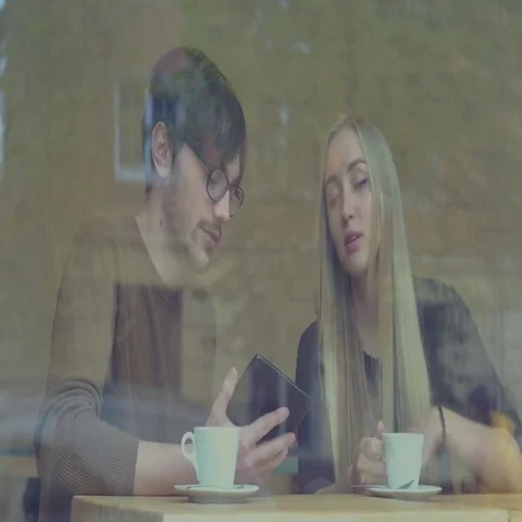 Young Couple in the Cafe Stock Footage 69425338
