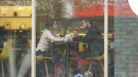Young couple in a cafe. Видео 84835473