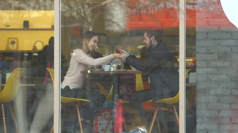 Young couple in a cafe. Видео 84835491