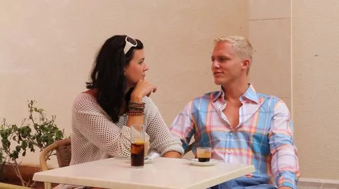 Young couple in a cafe in summer Stock Footage 41698634