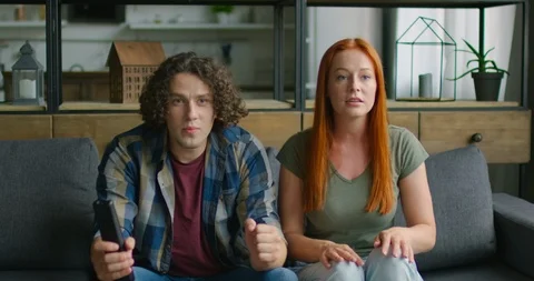 Young Couple Is Celebrating Win of Their Best Team Stock-Footage 115935128