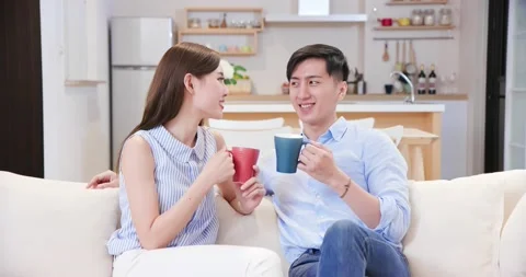 Young couple chatting at home Stock Footage 137624751