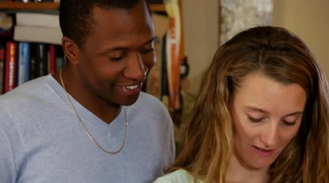 Young couple checking smartphone, pan up, pan down Stock Footage 53012743