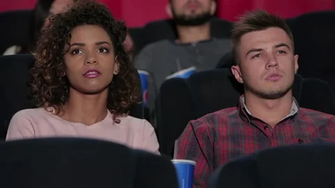 Young couple at the cinema Stock Footage 252654288