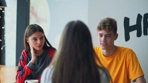 Young couple communicates with friends Stock Footage 143964321