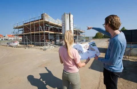 Young couple on construction site Stock Photos