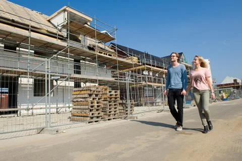 Young couple on construction site Foto stock