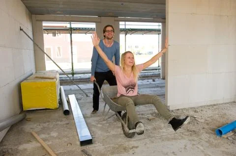 Young couple on construction site Stock Photos