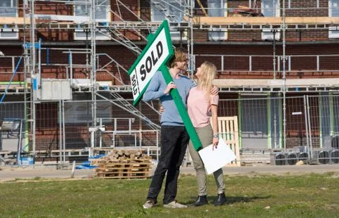 Young couple on construction site Stock Photos
