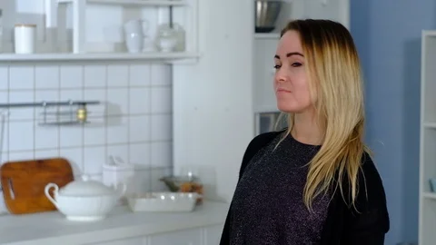 Young couple cuddling in the kitchen Stock-Footage 127263653