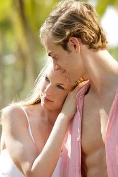 Young couple cuddling Stock Photos