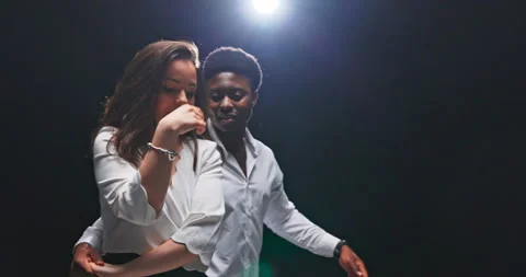 Young couple dancing at ballroom dance class tango, waltz, romantic dance in Stock Footage 157065048