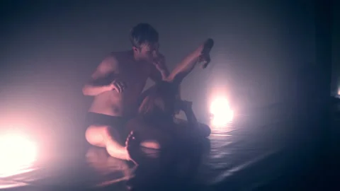 Young couple dancing modern erotic nto smoke cloud Stock Footage 230703389