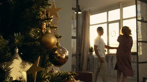 Young couple dancing in the new year living room Stock Footage 166141080