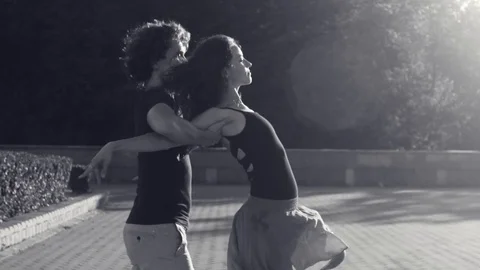 Young couple dancing on the square Stock Footage 79088036