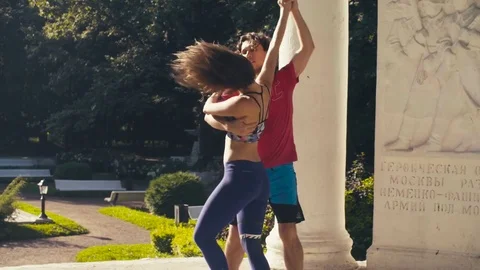 Young couple dancing on the square Stock-Footage 79357819