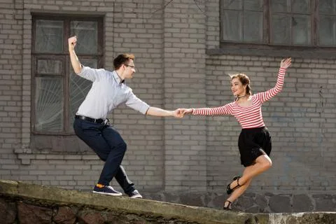 Young couple dancing swing Stock Photos