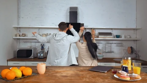 Young couple dancing together at kitchen Stock Footage 111741242