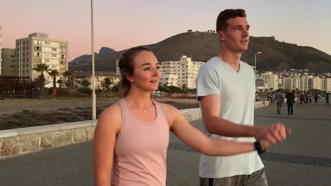 Young couple on date at sunset Stock Footage 76520690