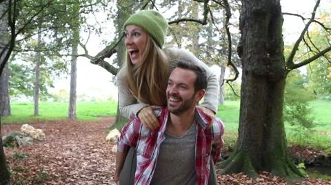 Young couple dating in forest Stock Footage 57376896