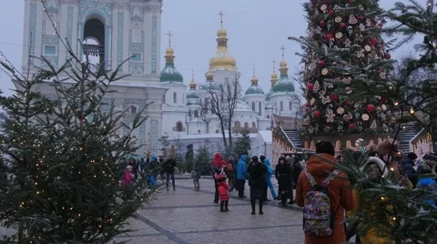 Young Couple at Decorated Sophia Square Christmas Decorated Fir Animator in Stock Footage 59132075