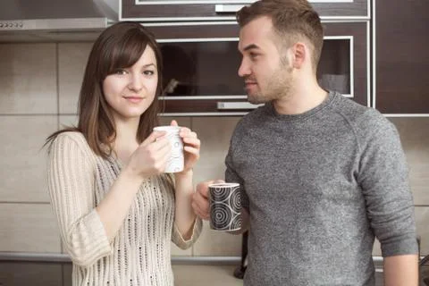 Young couple drinking coffee Stock Photos