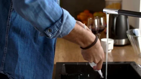 Young couple drinking red wine in the kitchen Stock-Footage 102546952