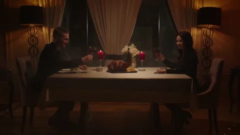 Young couple during a romantic dinner in an expensive restaurant. A man and a Stock Footage 237440078