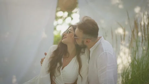 A young couple in each other's lower arms Stock Footage 248759233