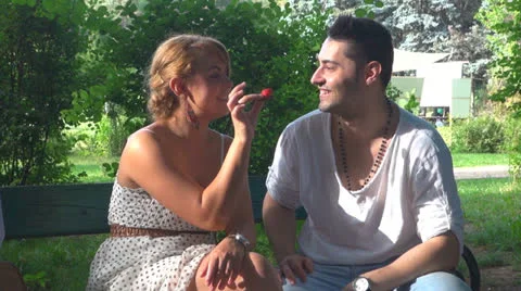 Young couple eats strawberry 스톡 동영상 23932679