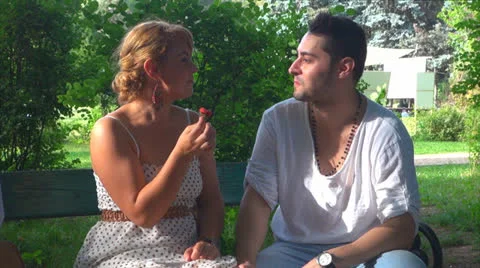 Young couple eats strawberry 스톡 동영상 23933904