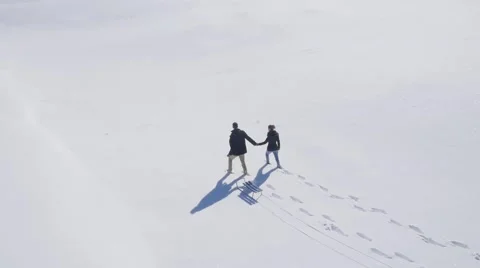 Young couple enjoy on the snow Stockbeeldmateriaal 58744092