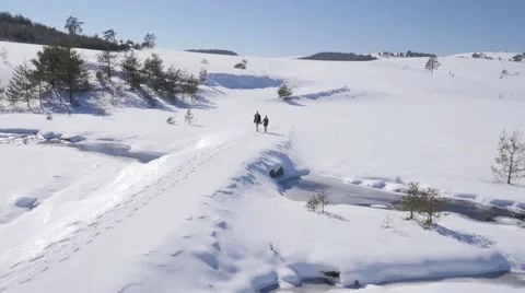 Young couple enjoy on the snow Stock Footage 58744426