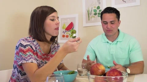 Young couple enjoying dinner in kitchen 스톡 동영상 64331840