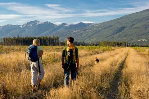 A young couple explores the back country, just North of Valemount, in the Stock Photos