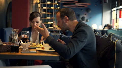 Young couple fighting, arguing during meal in cafe  Stock-Footage 62364563