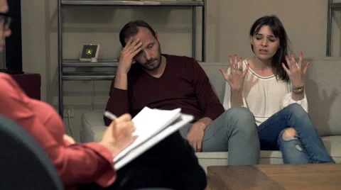 Young couple fighting during therapy at psychologist Stock Footage 61954377