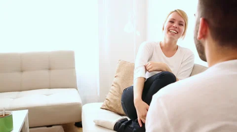Young couple flirting on the Sofa Stock-Footage 39756182