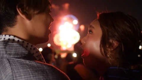 Young couple fun at fireworks show in Japan summer festival 스톡 동영상 94838136