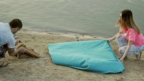 Young couple getting ready for vacation Stock Footage 79604040