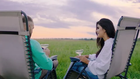 Young couple good looking together speeding funny time in the middle of nature Stock Footage 170013541