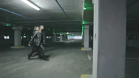 A young couple got lost in the Parking lot. Stock Footage 121601847